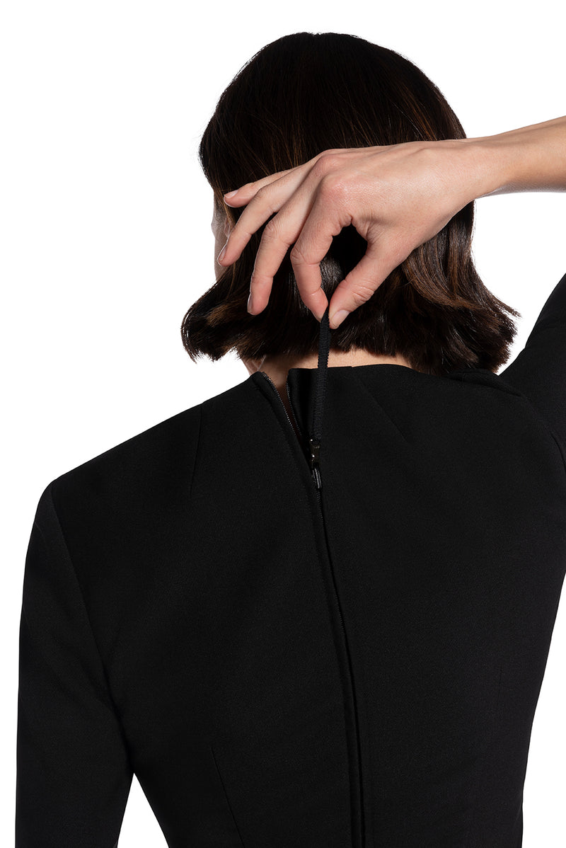 close-up back view of re-engineered zipper on woman 1 wearing the black alpha dress bring it on black collection