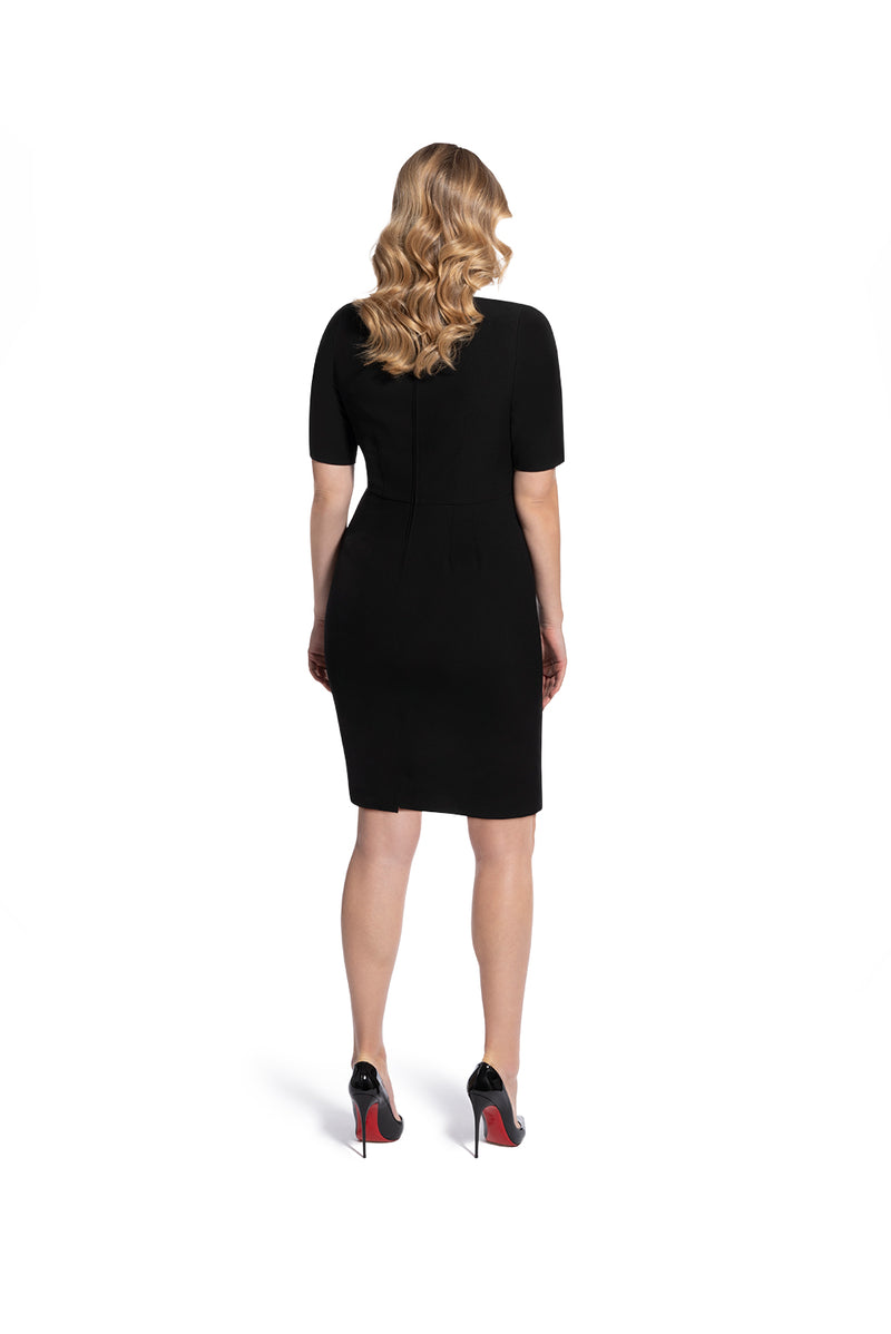 back view of woman 2 wearing the black alpha dress bring it on black collection