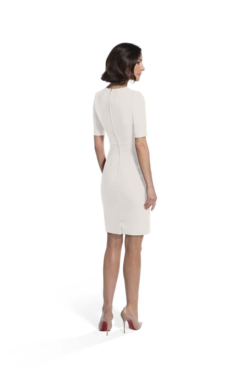 back view of woman 1 wearing the ivory alpha dress ivory collection